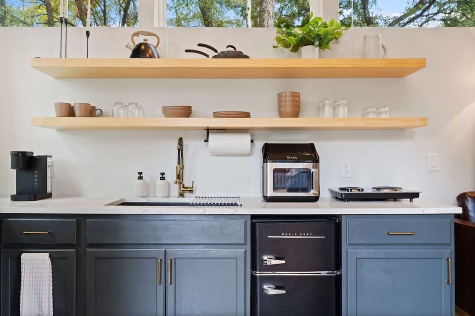 Wide open kitchen with great natural lighting, a serving tray for your R&R night-in with tea & coffee provided (but multiple top-notch coffee shops within walking distance!)