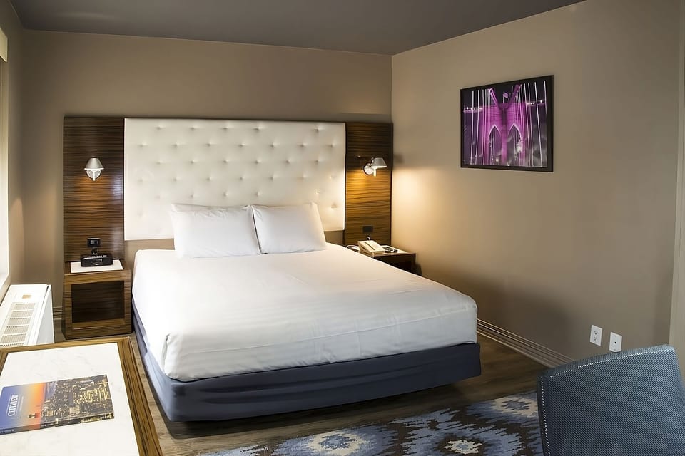 Sink into a plush king bed after city adventures.