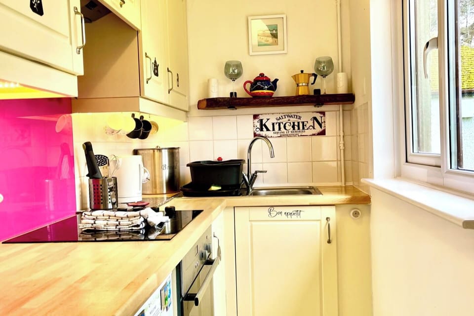 Kitchen. Full size oven and halogen hob, microwave, toaster, kettle, fridge freezer