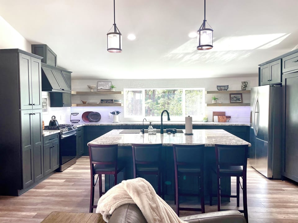 Large and gorgeous kitchen stocked with everything you'll need minus your food.