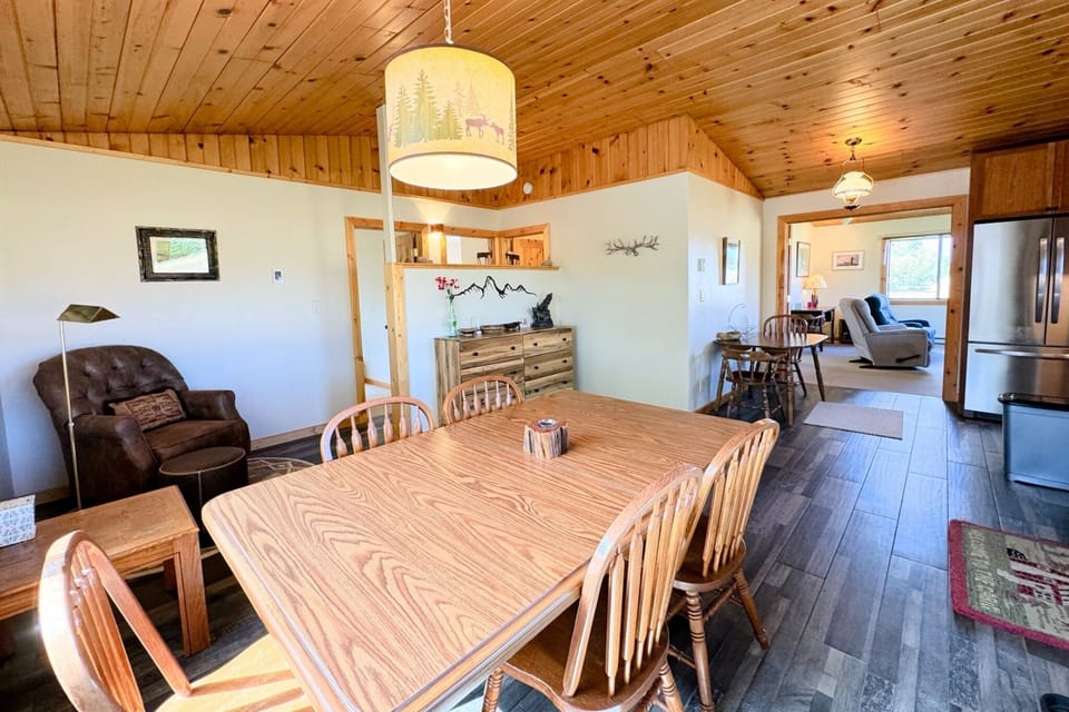 Gather around the dining table for meals or conversation.