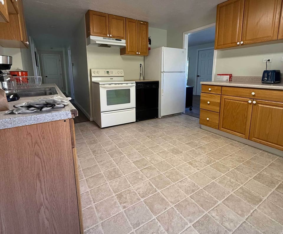 The kitchen has ample space to cook all of your meals.