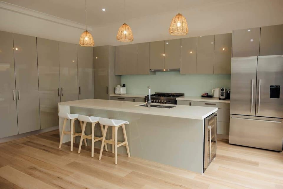 Fully equiped chefs kitchen with integrated wine fridge, 6 burner cook top, large oven, double fridge with ice maker, Nespresso coffee machine, plenty of storage. 