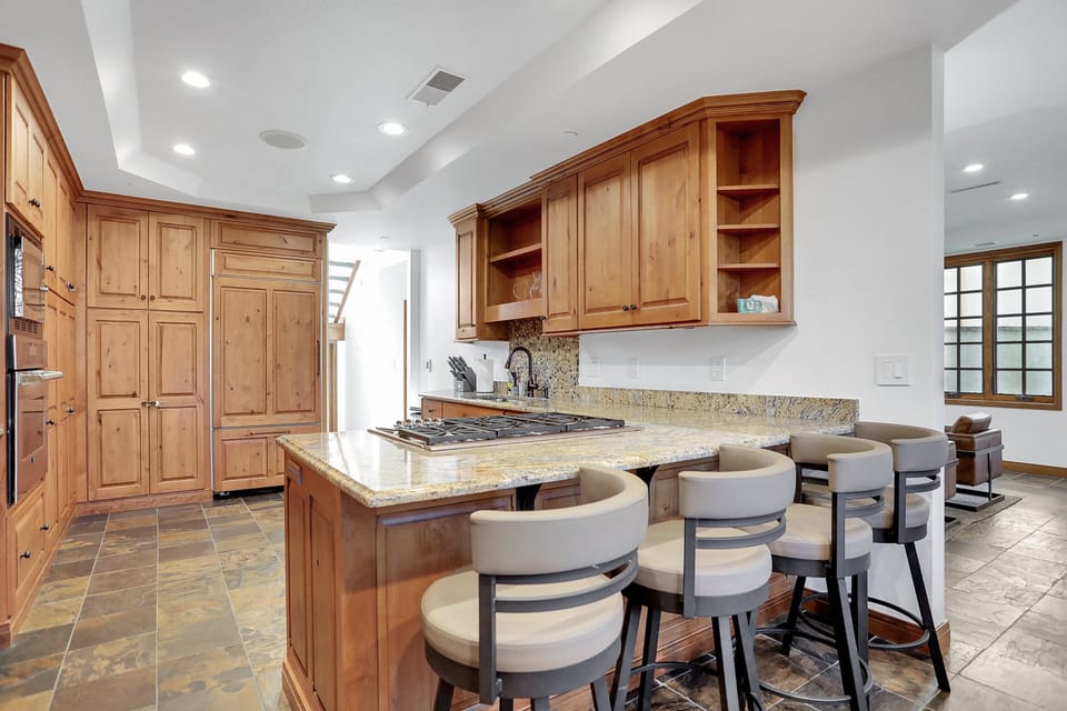Gourmet Kitchen with bar seating to keep the chef company