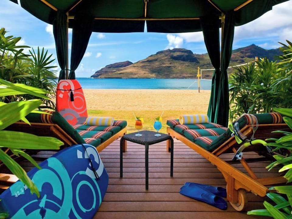Unwind on shaded loungers with ocean breezes and cocktails.