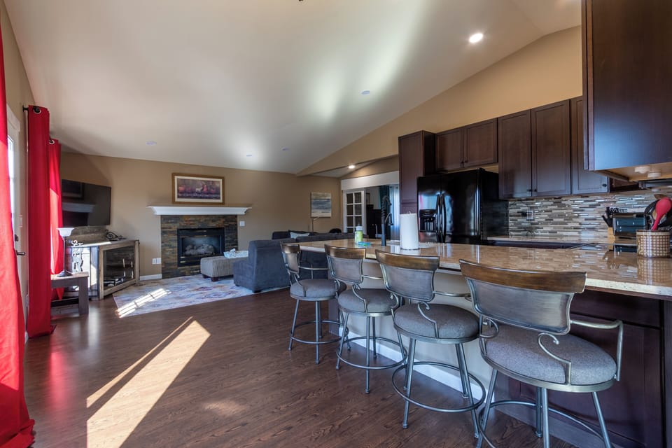 Full kitchen with another living room area