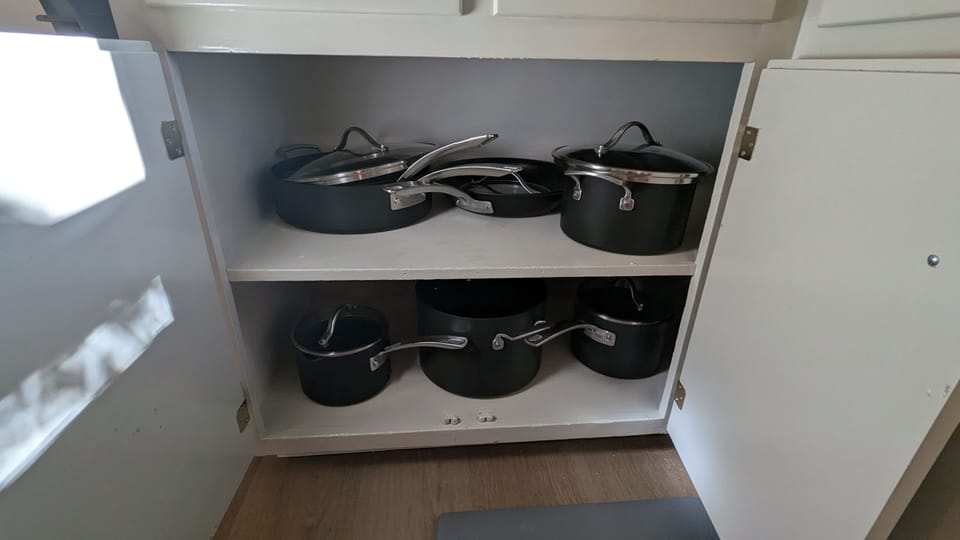 Pots, pans. baking sheets,crock pot, blender, glasses,plates,bowls, wine glasses
