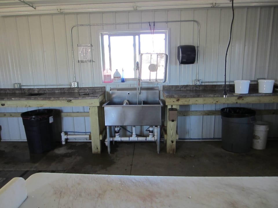 Heated fish cleaning property