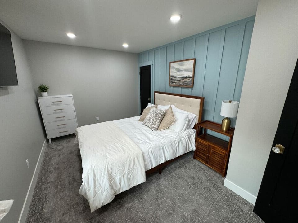 Queen Bed with Down Comforter and Dresser