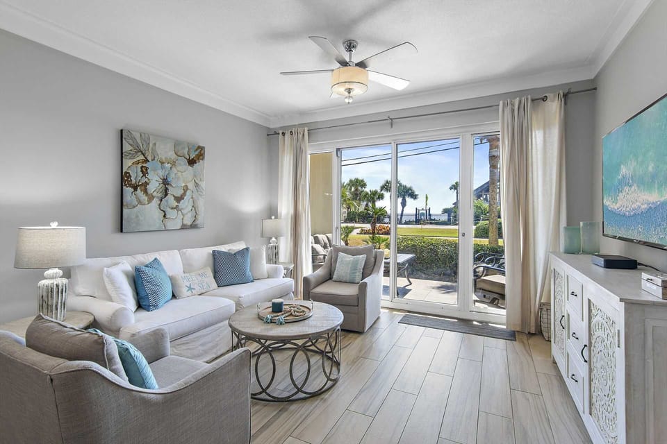 Spacious & Bright Living Room - Relax in comfort just steps from the Gulf at this Leeward Key condo in Destin, Florida.