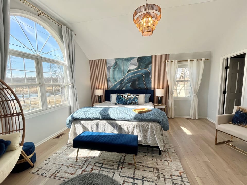 Master suite with Fox River View, Cathedral Ceiling and walking in closet. 