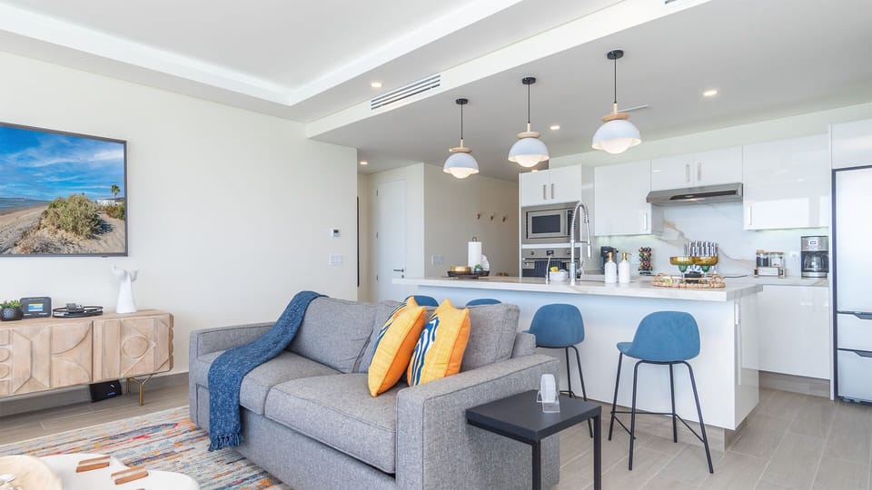 the living room and kitchen are close by each other