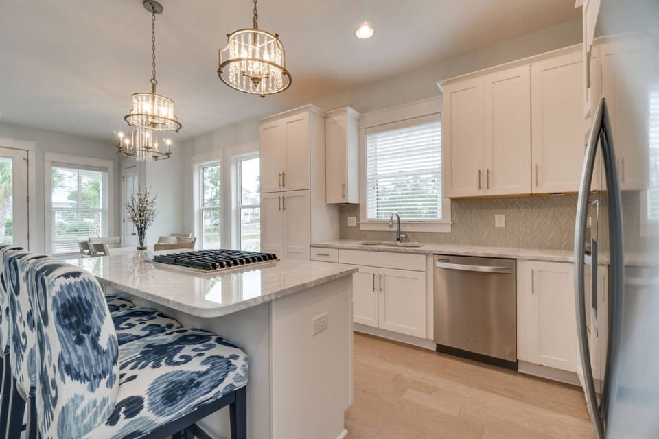 Beautiful open concept kitchen with seating for 3 at the large island