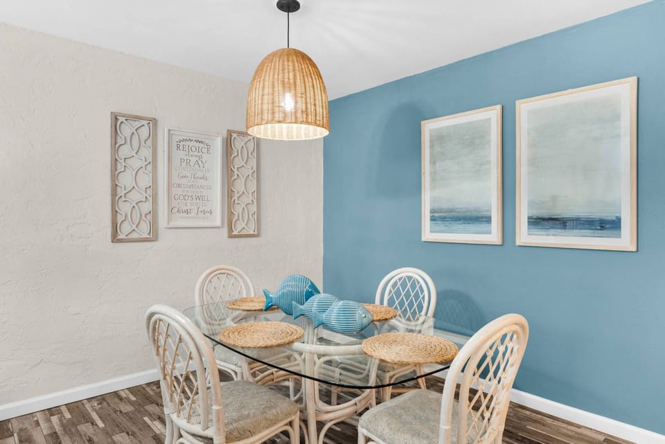 Coastal vibes and seating for four in this stylish dining area