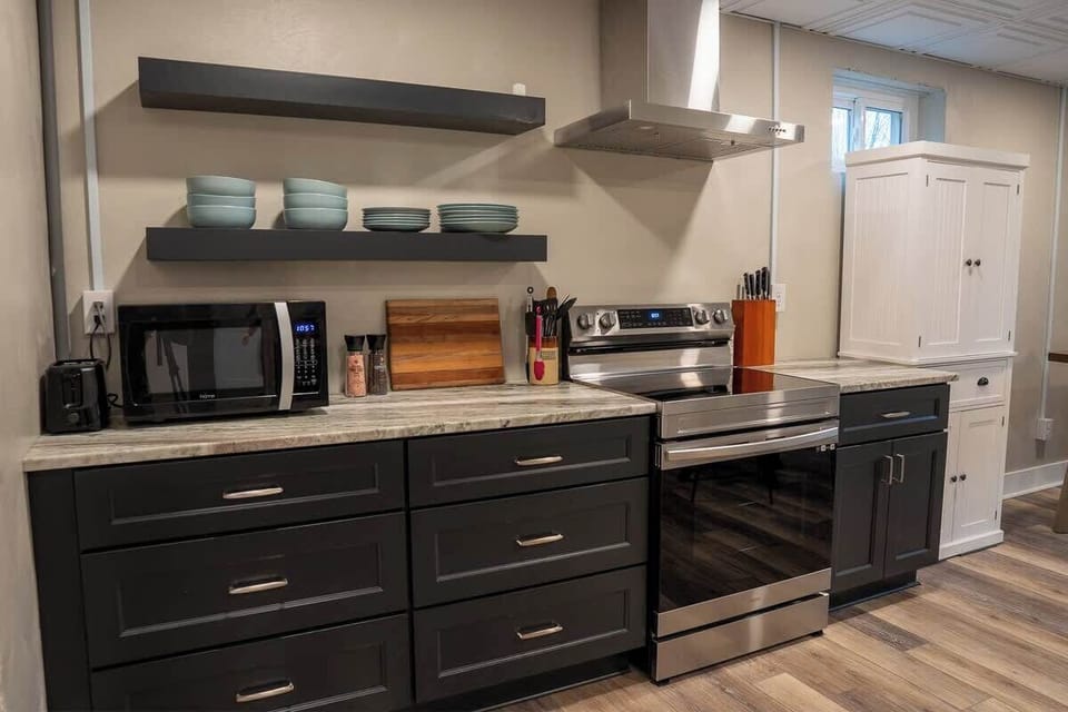 Fully equipped kitchen with stainless steel appliances