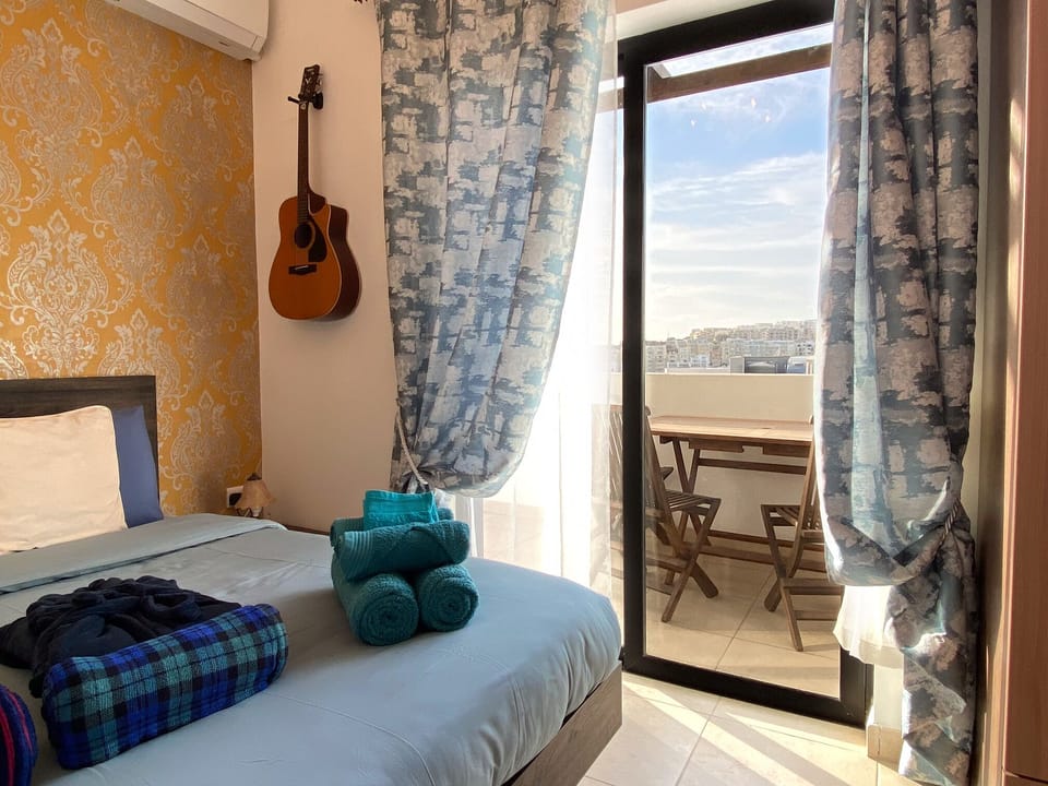 Bed / Guitar / Veranda
