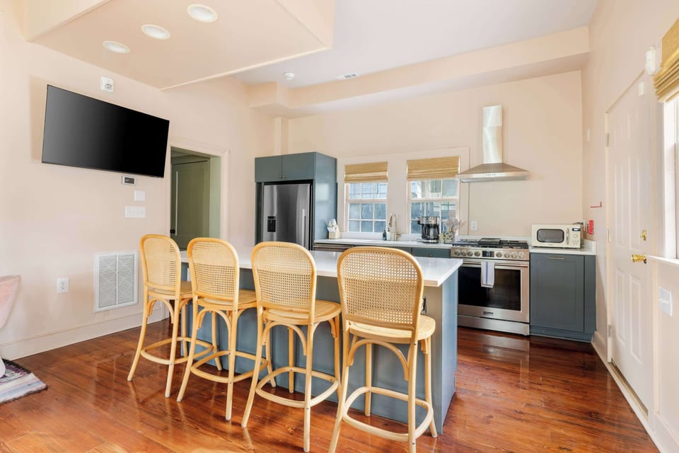 Fully equipped kitchen with everything you need to cook a meal with seating on the island