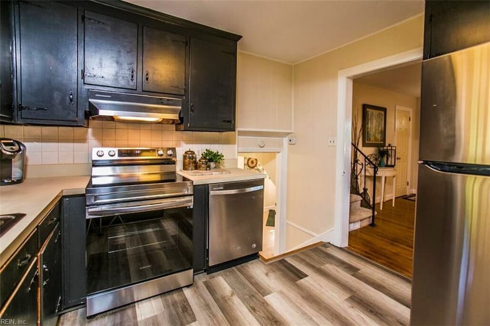 Cook and enjoy meals kitchen at home, oven, stove, dishwasher and refrigerator