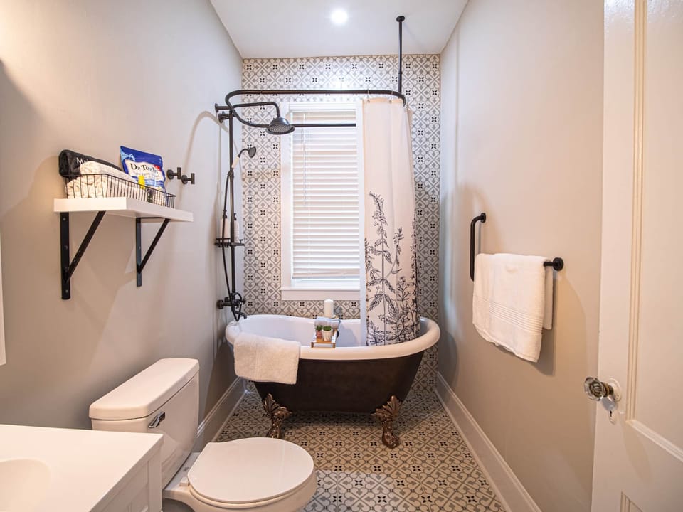 Ease into Relaxation by Soaking in Our Claw Foot Tub. We have All the Supplies You Need!