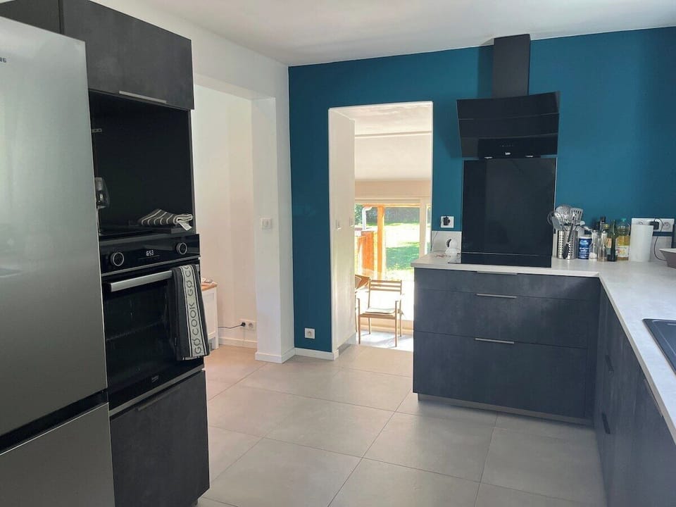 kitchen leads down to the sunny dining area