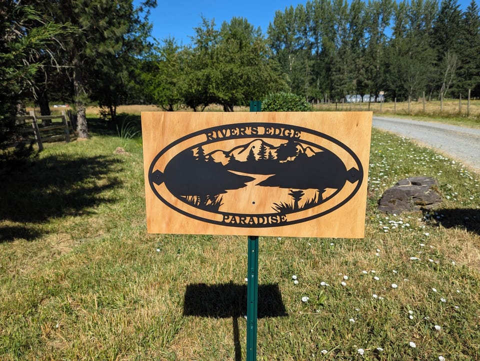 Sign at the entrance of the driveway.
