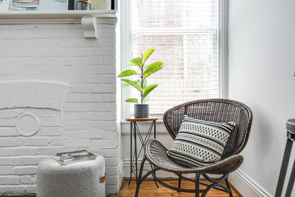 Reading Nook: Sunlit corner with stylish seating, perfect for morning coffee or evening relaxation.