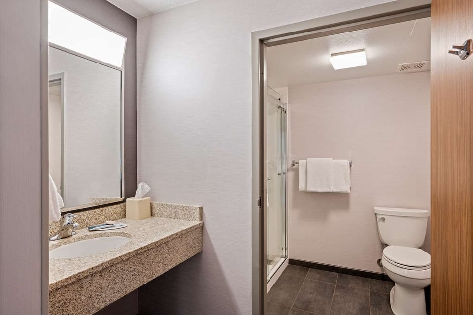 Refresh easily with a bright vanity and spotless bath area.