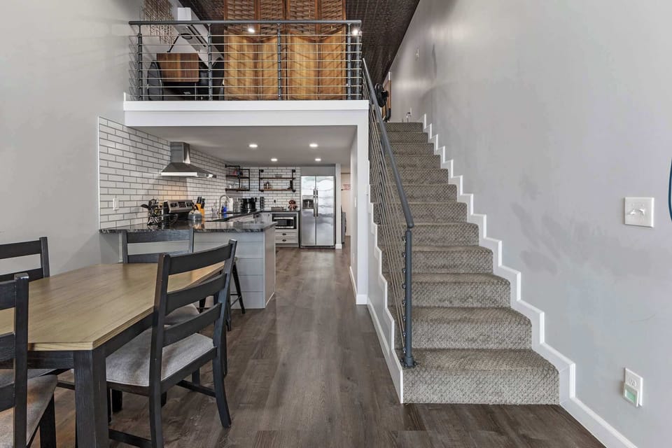 The stairs lead to the bedroom.