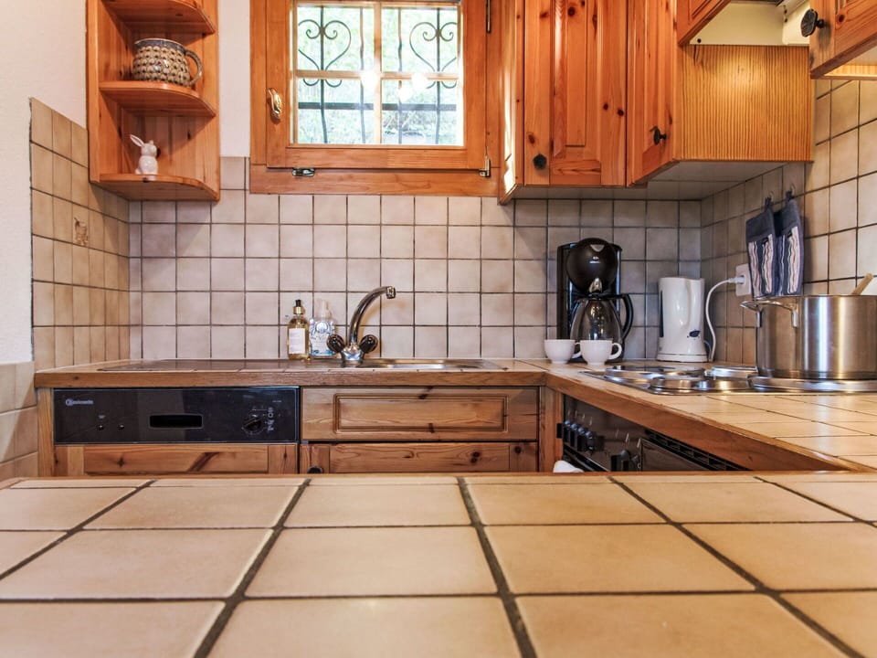 Brown, Cabinetry, Countertop, Tap, Kitchen Sink, Sink, Plumbing Fixture, Kitchen, Kitchen Stove, Kitchen Appliance