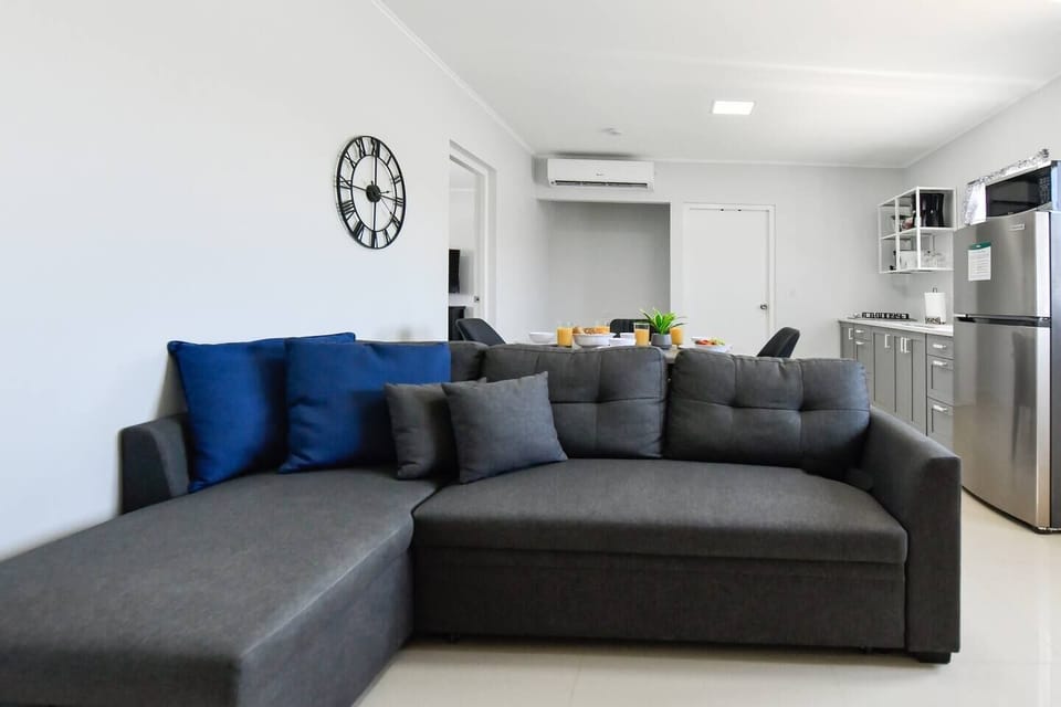 Plush gray sofas, perfect for lazy weekends and binge-watching TV