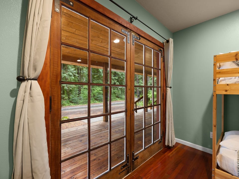 Create memories in this unique space! Rustic sliding doors and comfy bunk beds.