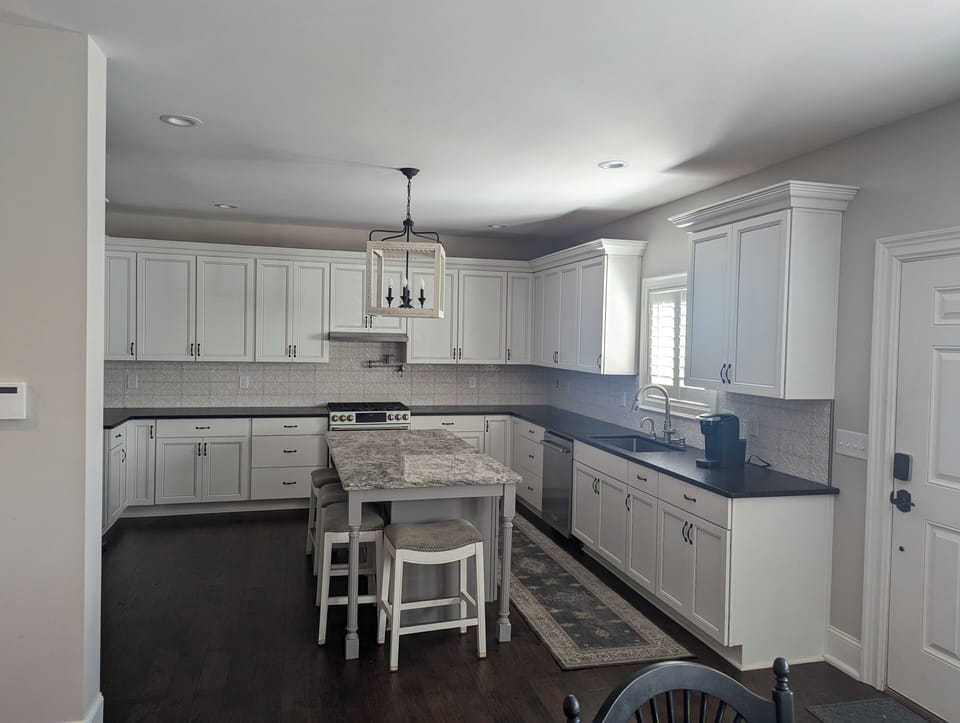 Kitchen area with bar seating
