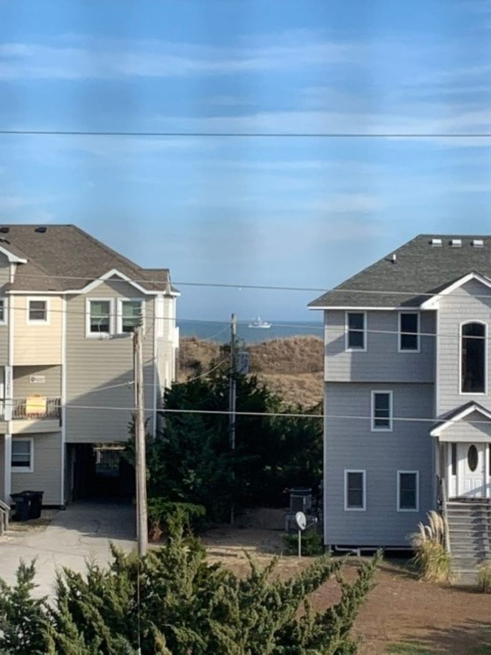 View from upper deck -- watching a boat in the ocean.
