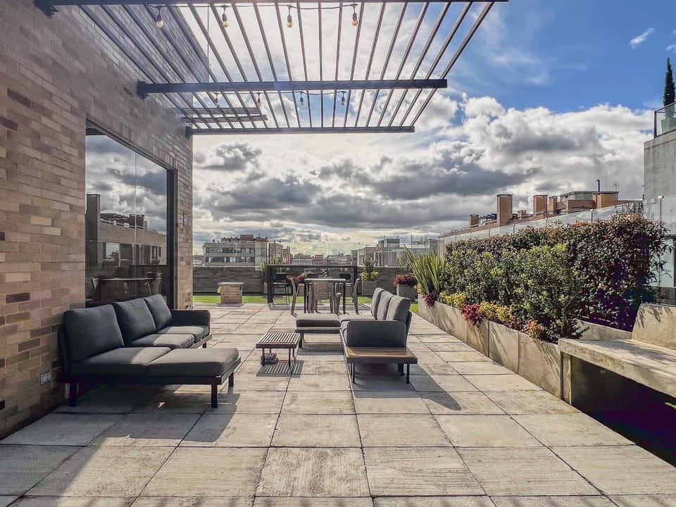 Garden with stylish tables

