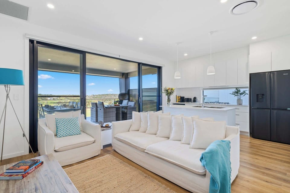 Embrace effortless living in this stylish open-concept lounge, dining, and kitchen area