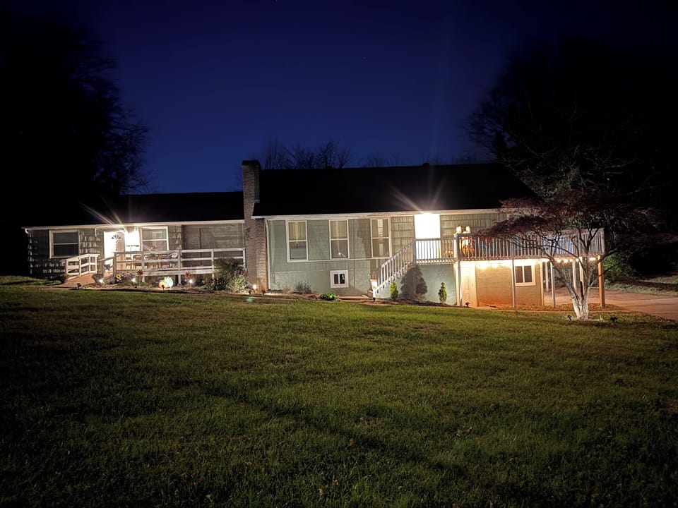 Peaceful nighttime view of the home—ideal for winding down after a long day.