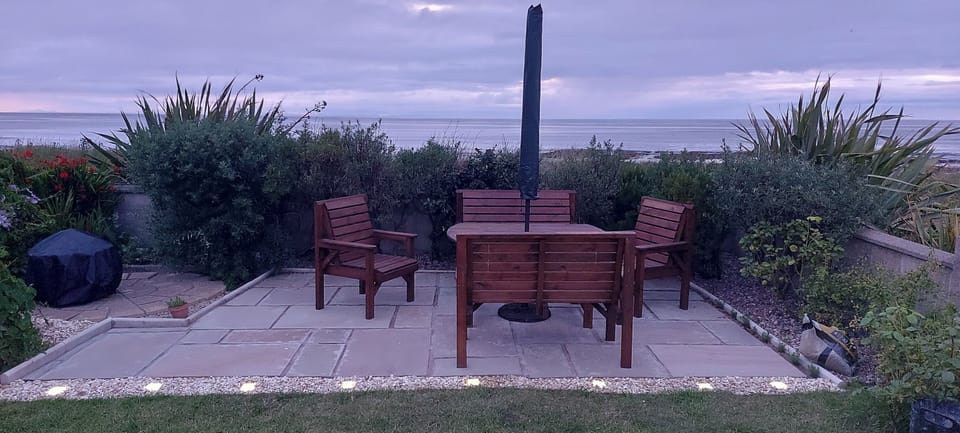 Large garden patio with BBW and fire pit