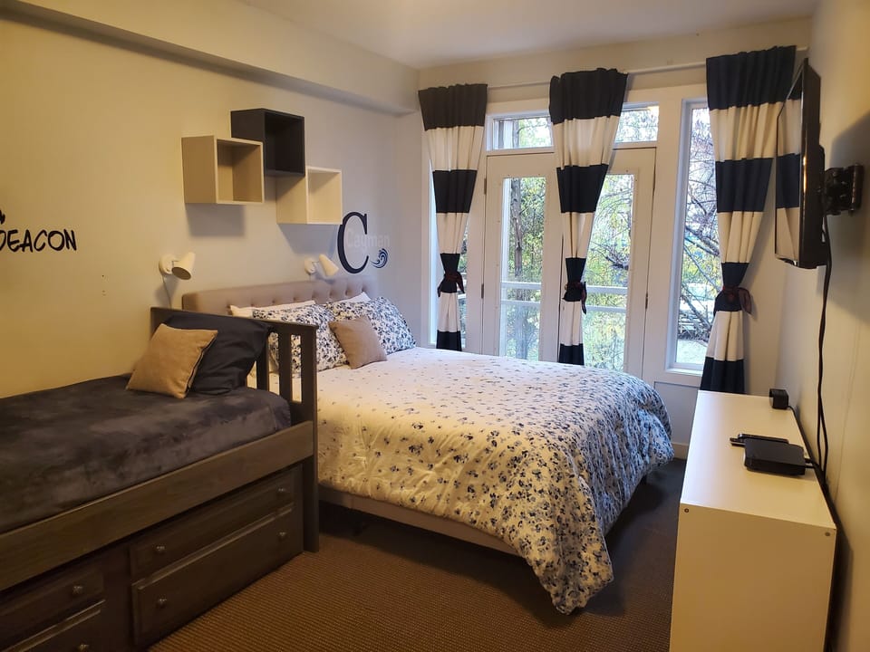 2nd bedroom has a queen bed and 2 single beds (trundle bed)
