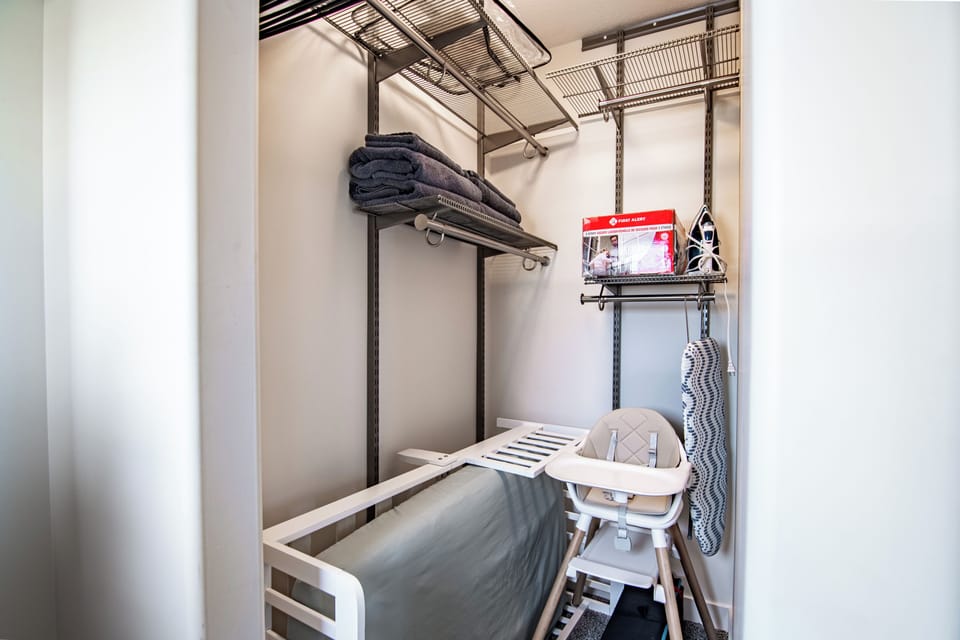 "Captain's room" closet; 3 story fire escape ladder, iron, baby items