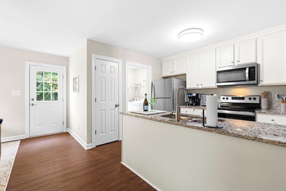 Laundry area beside kitchen