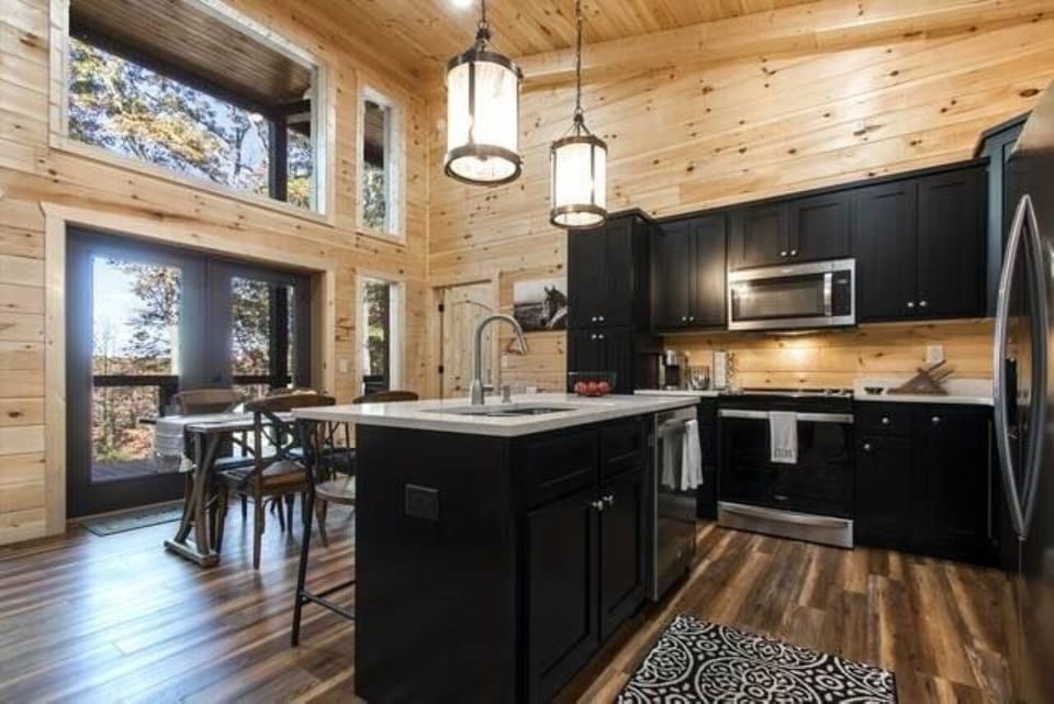 Stainless appliances make cooking   easy so you can dine with a scenic view.