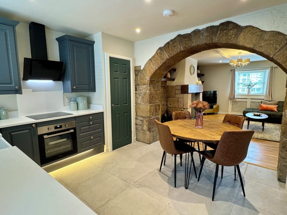 Dining area with seating for 4 people. Highchair available. 