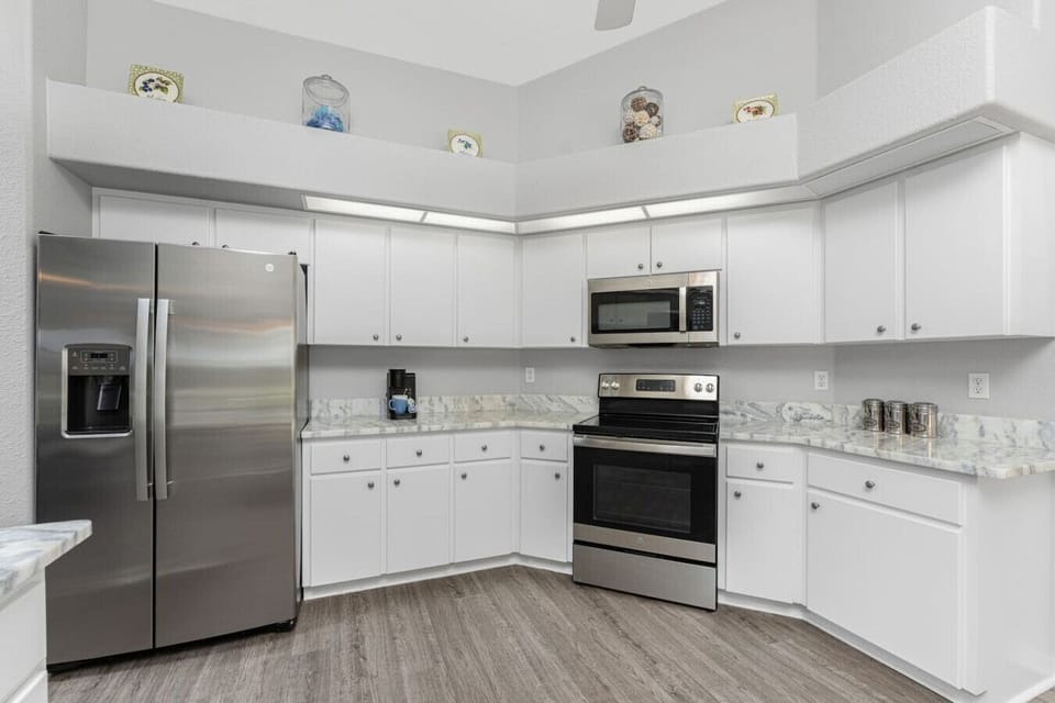 Beautiful White Kitchen with Coffee Maker
