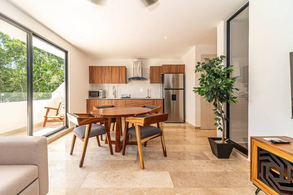 Elegant dining setup for four, with comfortable seating and a welcoming atmosphere