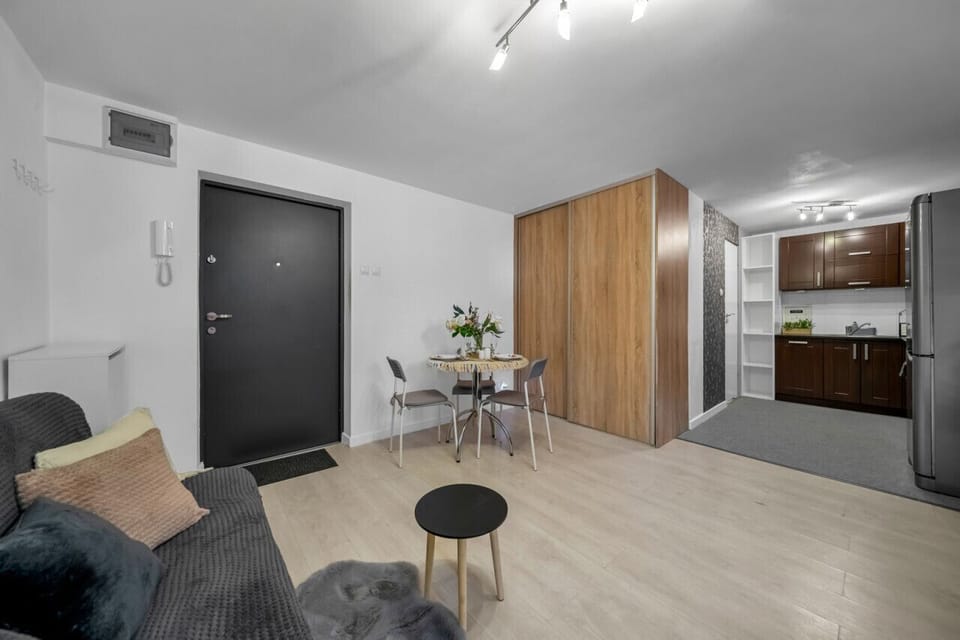 Comfortable Living Room with Sofa Bed and Smart TV | Book Now with RENTUJEMY