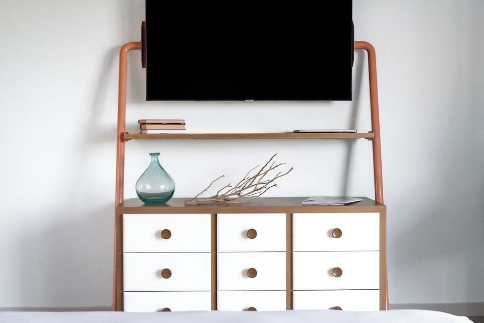 Kick back and stream favorites on the large flat-screen TV