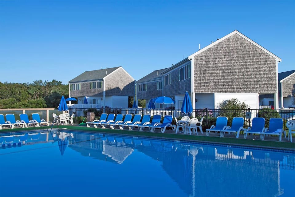 Dive into a sparkling pool with breezy coastal vibes.