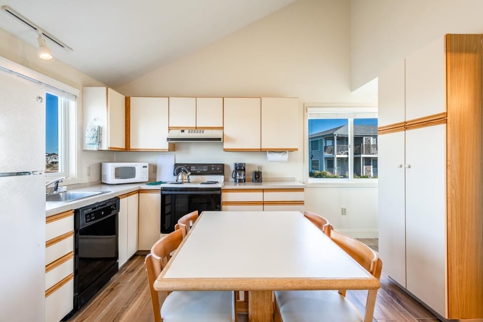 Gather for easy meals in the bright, fully equipped kitchen.