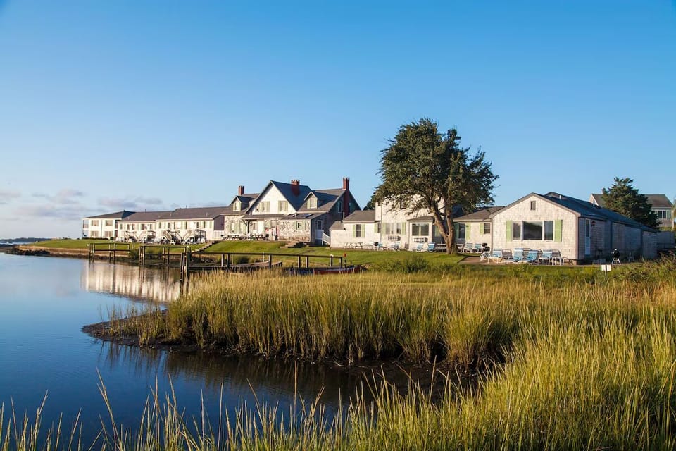 Arrive to a classic seaside compound framed by calm waters.