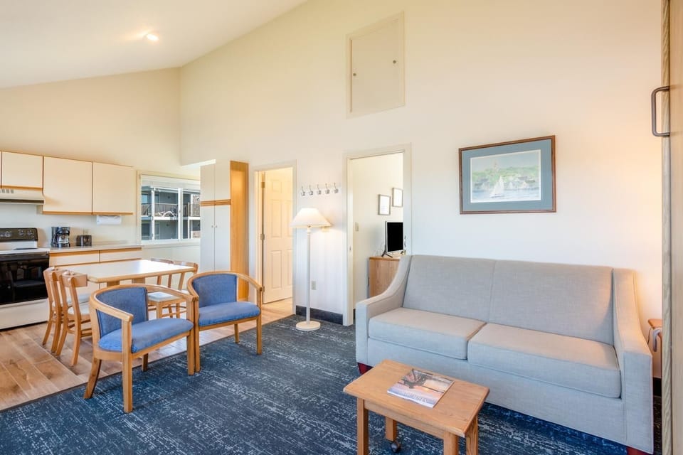 Relax in the airy open-plan suite with comfortable seating.